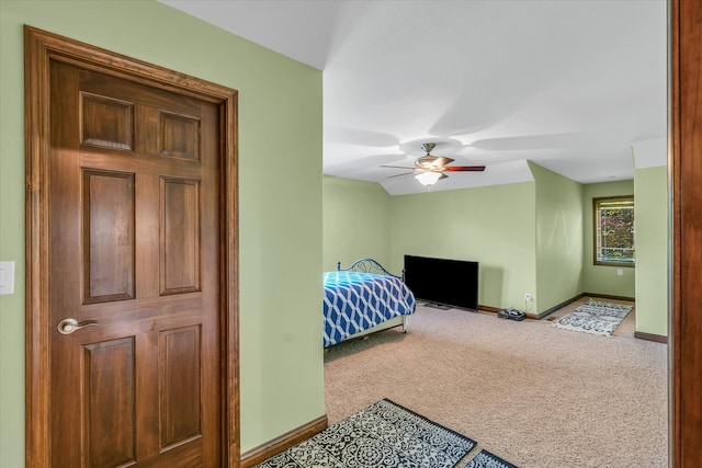 bedroom featuring ceiling fan and carpet floors