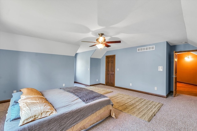 carpeted bedroom with lofted ceiling and ceiling fan