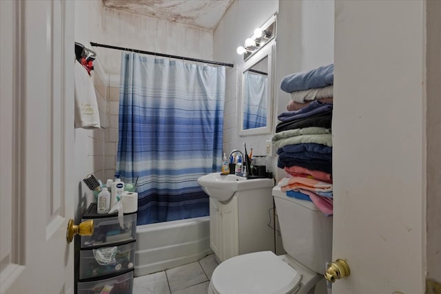 full bathroom with shower / bath combo, vanity, and toilet