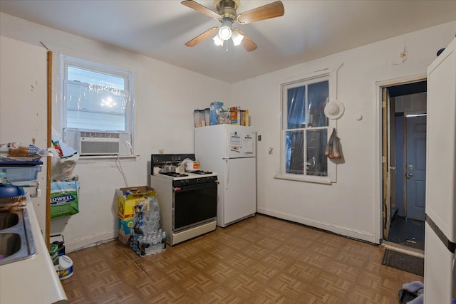 kitchen with cooling unit, white appliances, ceiling fan, and light parquet flooring