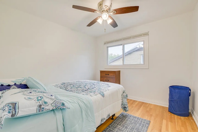 bedroom featuring light hardwood / wood-style floors and ceiling fan