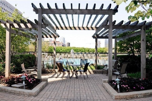 view of patio featuring a pergola