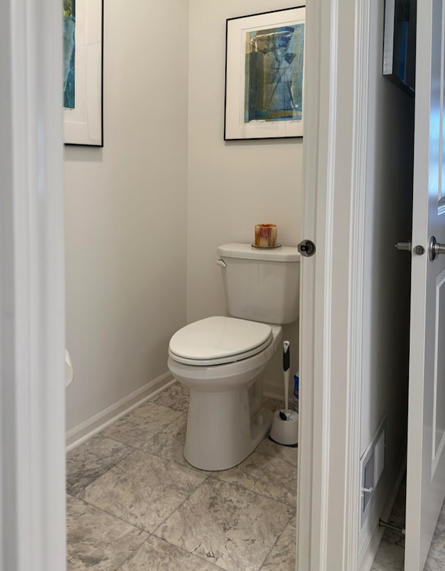 bathroom featuring toilet