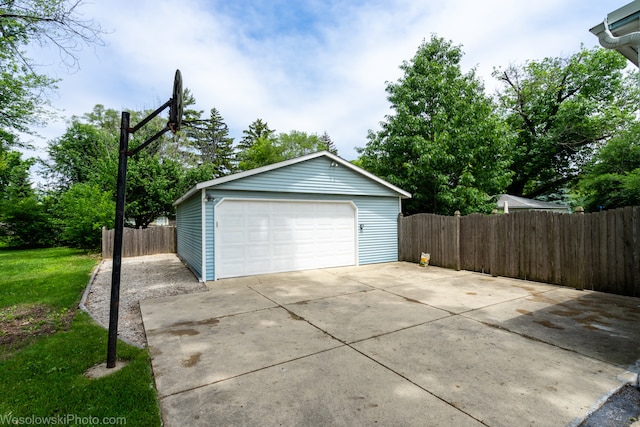 garage with a lawn