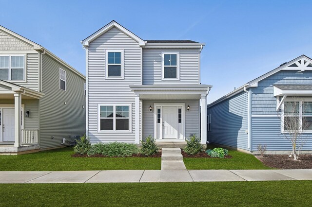 view of front of home featuring a front lawn