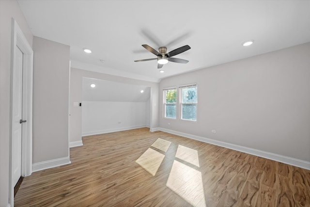 spare room featuring ceiling fan and light wood-type flooring