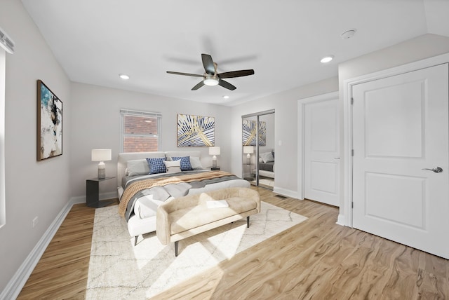 bedroom featuring ceiling fan and light hardwood / wood-style flooring