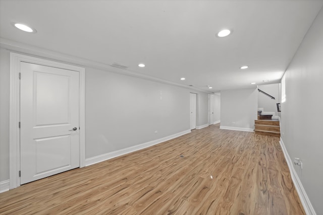 basement featuring light wood-type flooring