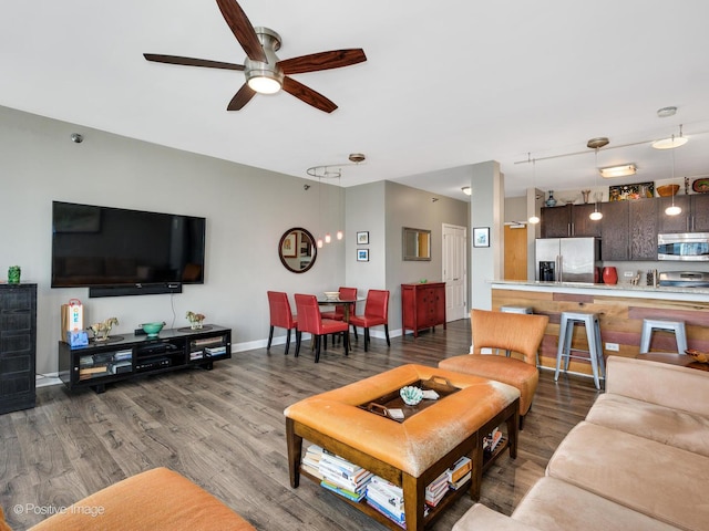 757 N Orleans St Unit 1612, Chicago, IL 60654 - living room featuring wood finished floors, ceiling fan, and baseboards
