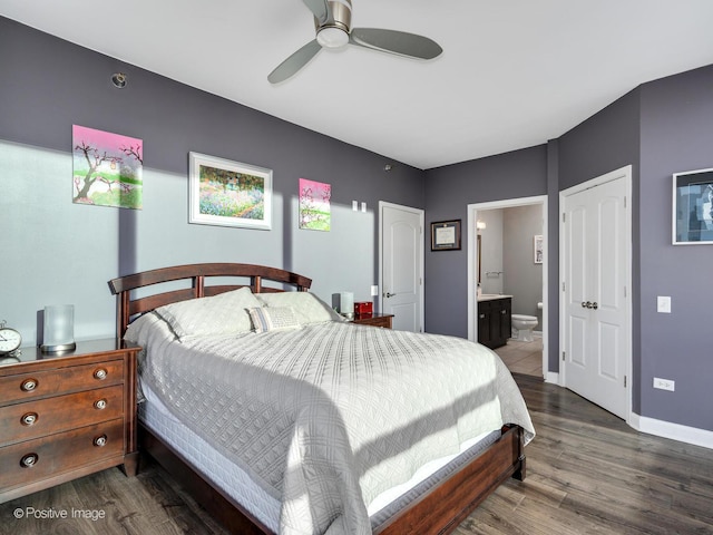 757 N Orleans St Unit 1612, Chicago, IL 60654 - bedroom featuring baseboards, wood finished floors, connected bathroom, and a ceiling fan