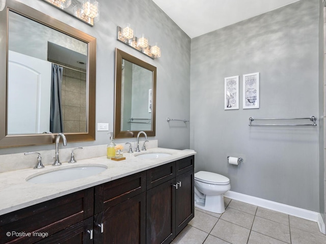 757 N Orleans St Unit 1612, Chicago, IL 60654 - full bath with tile patterned flooring, double vanity, toilet, baseboards, and a shower with shower curtain