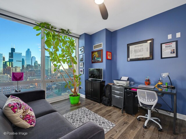 757 N Orleans St Unit 1612, Chicago, IL 60654 - office featuring ceiling fan, a wall of windows, wood finished floors, and baseboards