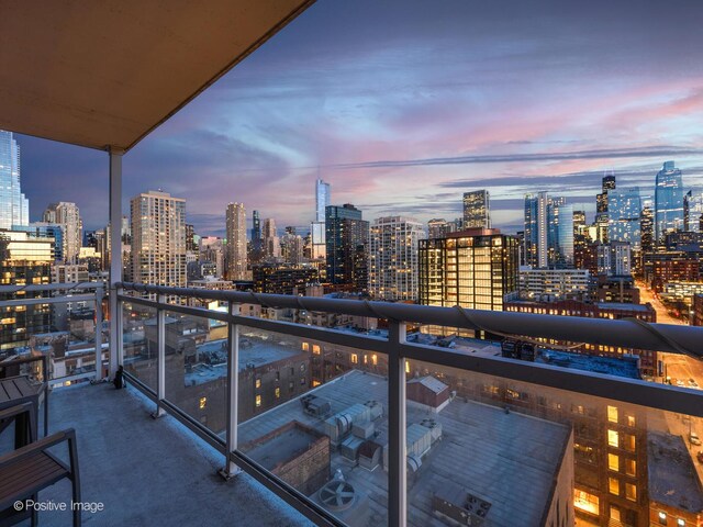 757 N Orleans St Unit 1612, Chicago, IL 60654 - balcony at dusk with a skyline view