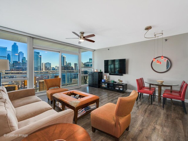 757 N Orleans St Unit 1612, Chicago, IL 60654 - living room featuring a skyline view, wood finished floors, ceiling fan, baseboards, and a wall of windows