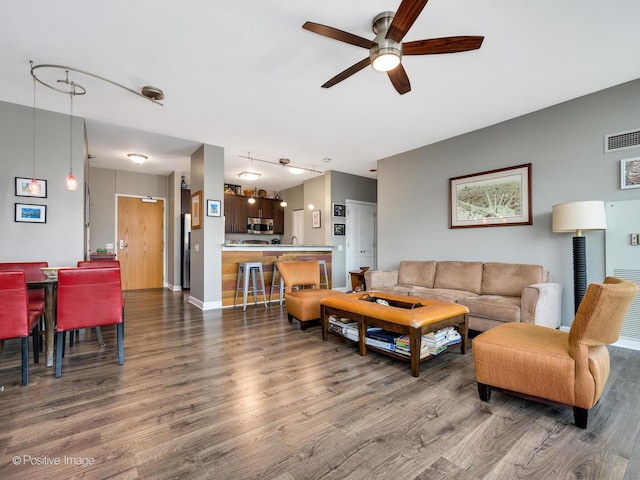 757 N Orleans St Unit 1612, Chicago, IL 60654 - living area with dark wood-style floors, ceiling fan, and baseboards