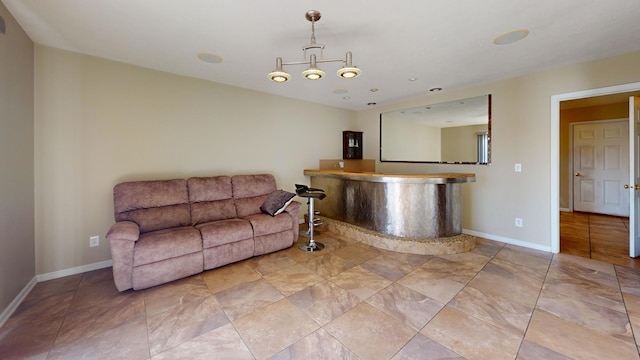 living room with an inviting chandelier