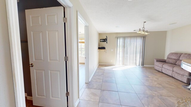 living room featuring light tile patterned flooring