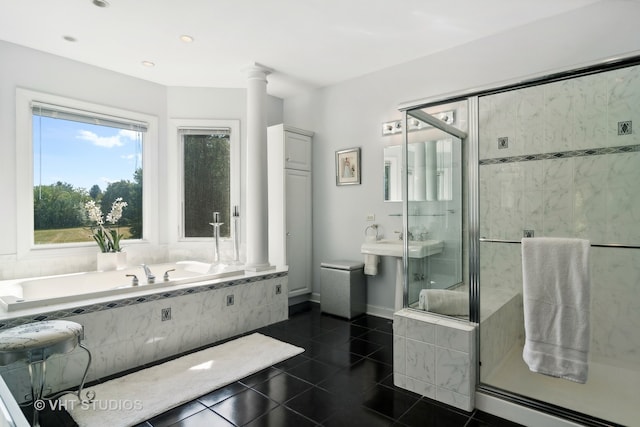 bathroom with separate shower and tub and tile patterned floors