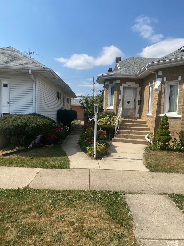 view of home's exterior featuring a yard