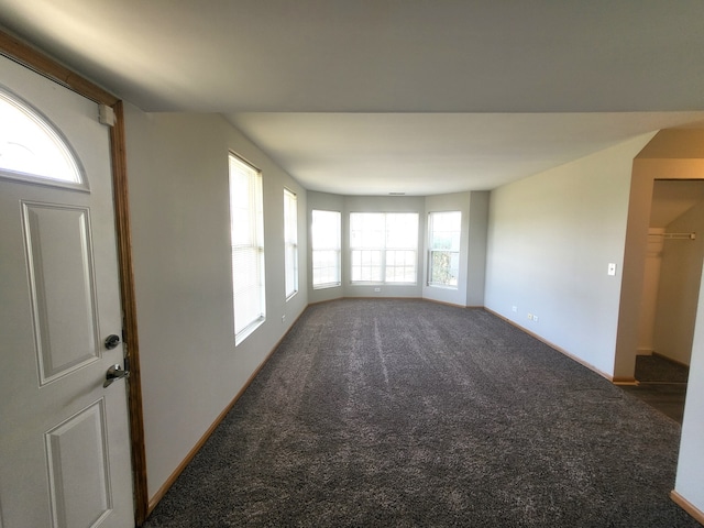 interior space with dark carpet