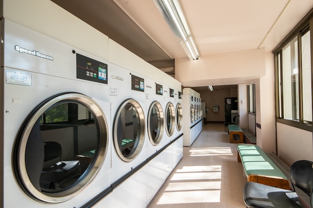 laundry room with independent washer and dryer