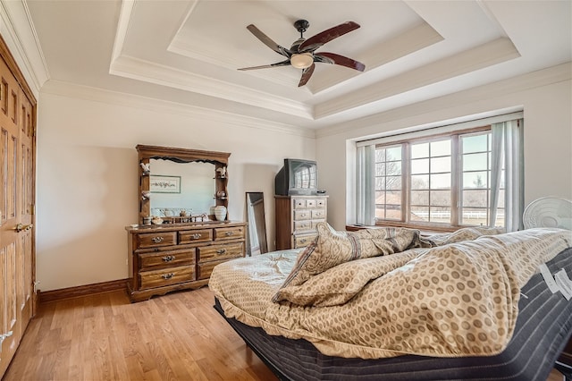 36625 N Kimberwick Ln, Wadsworth, IL 60083 - bedroom with a raised ceiling, light wood-type flooring, a ceiling fan, and ornamental molding