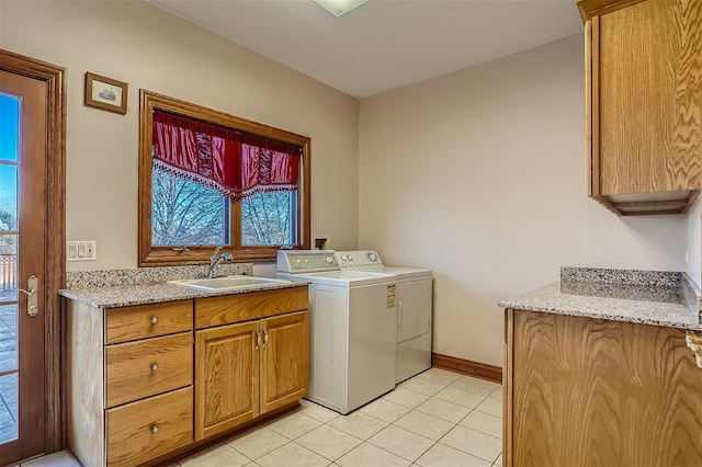 36625 N Kimberwick Ln, Wadsworth, IL 60083 - laundry room with separate washer and dryer, plenty of natural light, light tile patterned floors, and cabinet space