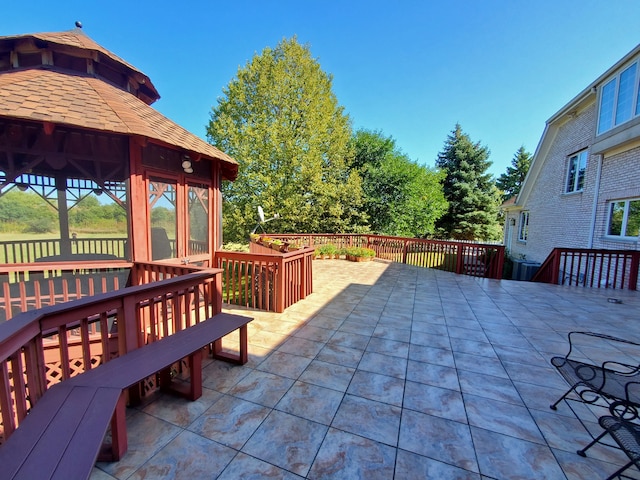 view of patio / terrace with a gazebo and a deck