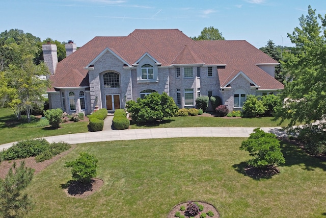 view of front of home with a front lawn