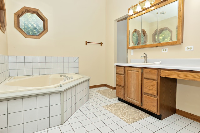 bathroom featuring tile patterned flooring, vanity, and a relaxing tiled tub