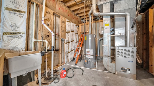 utility room with water heater