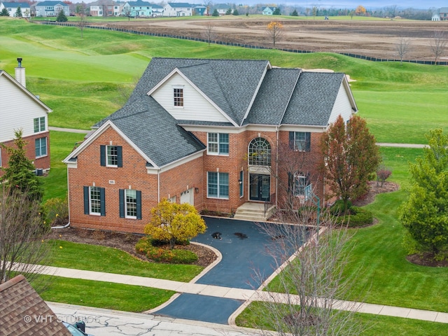 colonial home featuring a garage