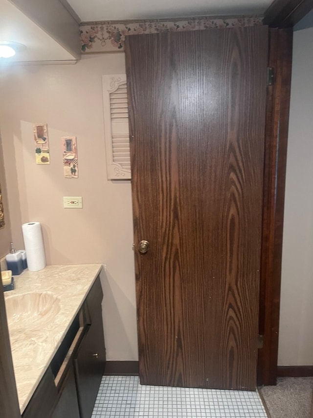 bathroom featuring vanity and tile patterned floors