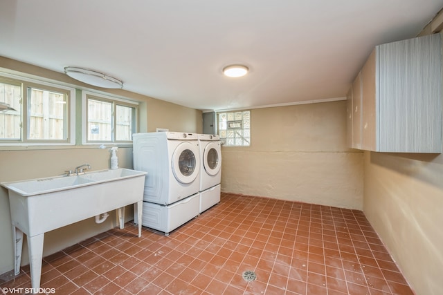 laundry area with washing machine and dryer