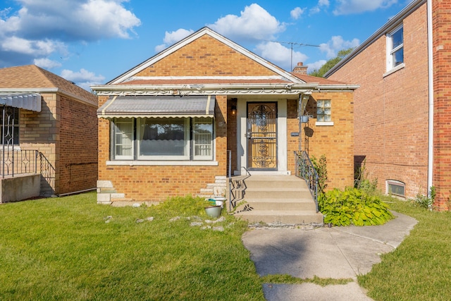 bungalow with a front lawn