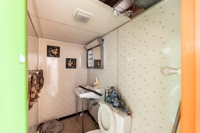 bathroom featuring toilet