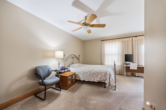 bedroom with light carpet and ceiling fan