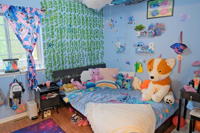 bedroom featuring hardwood / wood-style floors