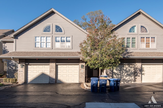 front of property with a garage