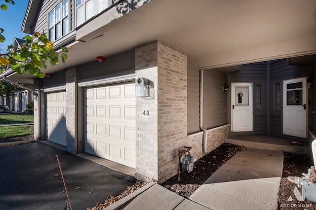 property entrance featuring a garage