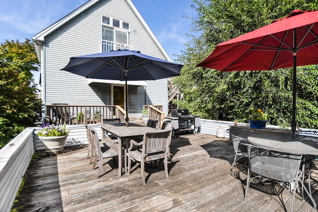 wooden terrace with area for grilling