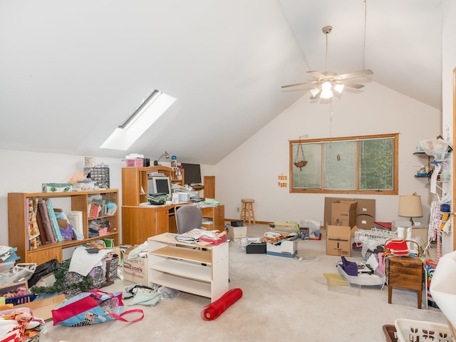 additional living space featuring vaulted ceiling with skylight, carpet flooring, and ceiling fan