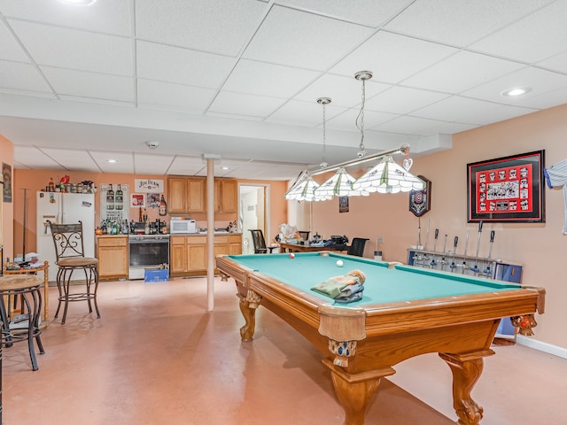 game room with billiards, a paneled ceiling, and indoor bar