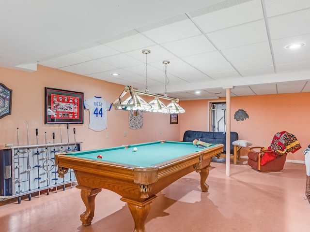 recreation room featuring a drop ceiling, indoor bar, pool table, and concrete flooring