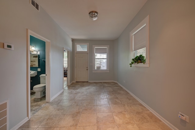 entrance foyer featuring light tile patterned floors