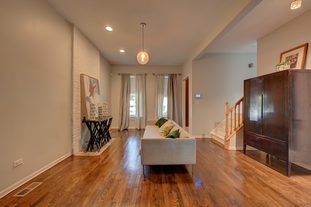 living room featuring wood-type flooring