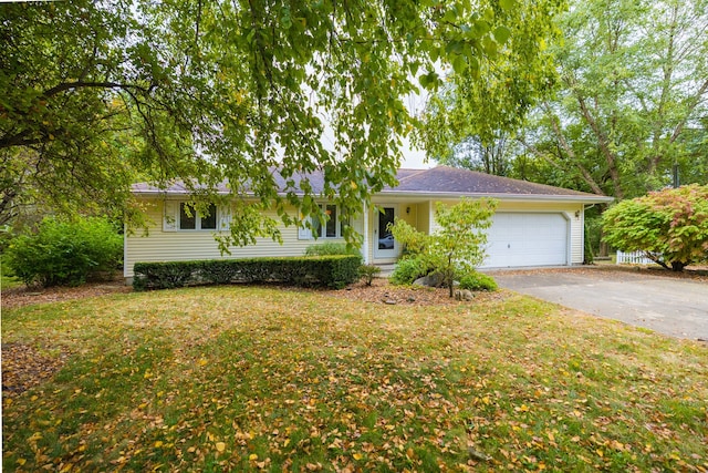 single story home with a front lawn and a garage