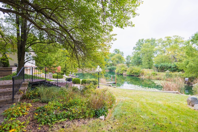 view of yard with a water view