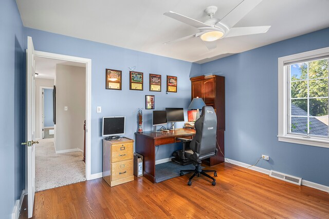 office area featuring ceiling fan and hardwood / wood-style flooring