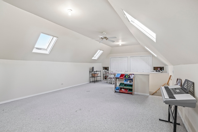 rec room featuring carpet, lofted ceiling, and ceiling fan